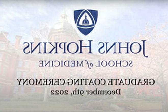 sign for graduate coating ceremony in 2022